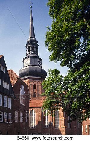 Stock Image - Low angle view of clock tower, Church St. Cosmae, Lower Saxony, Germany . Fotosearch