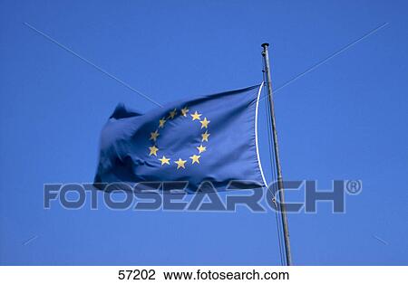 Stock Image - Low angle view of European Union flag . Fotosearch