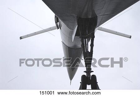 Stock Image - Low angle view of fighter plane . Fotosearch