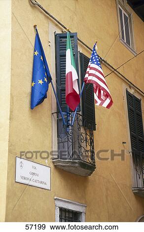 Stock Photo - Low angle view of flags, Italy, Europe . Fotosearch