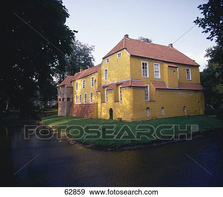 Moated castle under blue sky, Manninga Castle, Pewsum, East Frisia, Lower Saxony, Germany View Large Photo Image Stock Photo - Moated castle under blue sky, Manninga Castle, Pewsum, East Frisia, Lower Saxony, Germany . Fotosearch