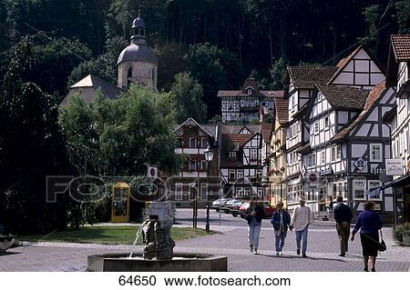 People walking in street, St. Marien Church, Bad Sooden-Allendorf, Werra-Meißner, Hesse, Germany View Large Photo Image Stock Image - People walking in street, St. Marien Church, Bad Sooden-Allendorf, Werra-Meißner, Hesse, Germany . Fotosearch