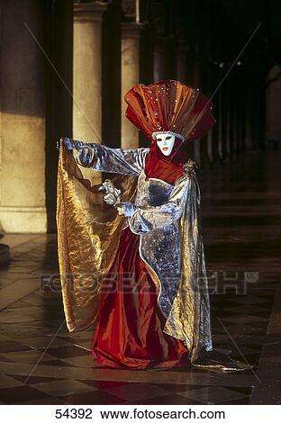 Stock Image - Person wearing traditional costume in carnival, Venice, Italy . Fotosearch