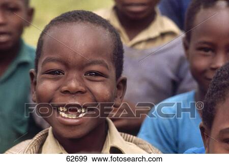 Stock Photo - Portrait of boy smiling . Fotosearch