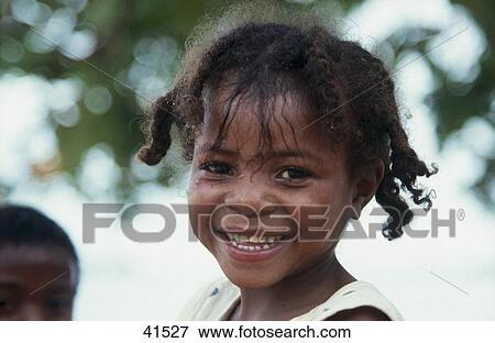 Portrait of girl smiling, Nosy Komba, Nosy Be, Madagascar View Large Photo Image Stock Photo - Portrait of girl smiling, Nosy Komba, Nosy Be, Madagascar . Fotosearch