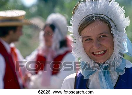 Portrait of young woman smiling in traditional clothes, Olsztynek, Poland View Large Photo Image Stock Photograph - Portrait of young woman smiling in traditional clothes, Olsztynek, Poland . Fotosearch