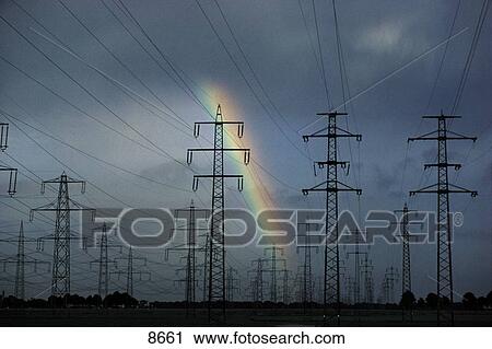 Rainbow behind electricity pylons, Germany View Large Photo Image Stock Image - Rainbow behind electricity pylons, Germany . Fotosearch
