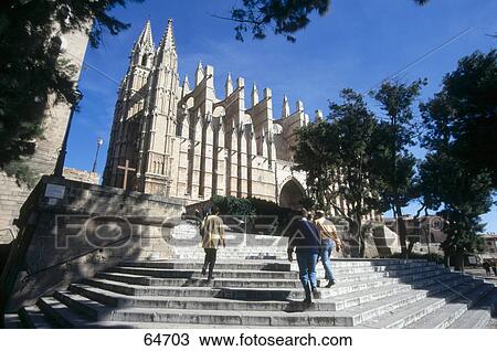 Rear view of people walking upstairs, Palma De Mallorca, Majorca, Balearic Islands, Spain View Large Photo Image Stock Image - Rear view of people walking upstairs, Palma De Mallorca, Majorca, Balearic Islands, Spain . Fotosearch