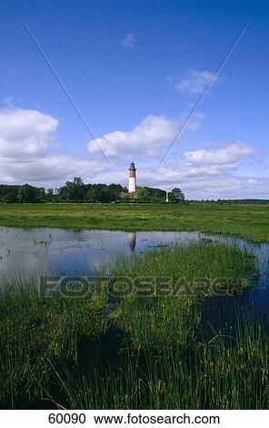 Reflection of lighthouse in pond, Schleswig-Holstein, Germany, Europe View Large Photo Image Stock Image - Reflection of lighthouse in pond, Schleswig-Holstein, Germany, Europe . Fotosearch
