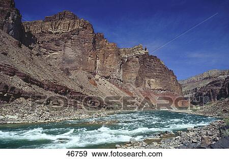 Stock Photo - River flowing along mountains, Colorado River, Grand Canyon, Arizona, USA . Fotosearch