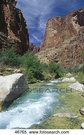 Stock Photography - River flowing through rocks, Colorado River, Grand Canyon, Arizona, USA . Fotosearch