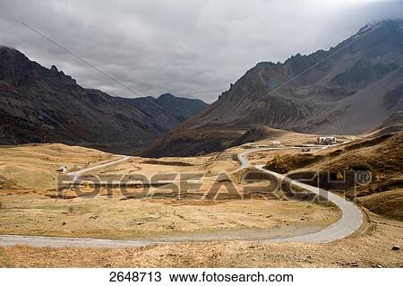 Stock Image - Road passing through mountains, Gap, France . Fotosearch