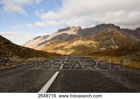 Stock Photograph - Road passing through mountains, Gap, France . Fotosearch