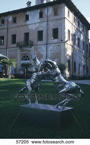 Sculpture in front of building, Lake Maggiore, Stresa, Italy View Large Photo Image Stock Photography - Sculpture in front of building, Lake Maggiore, Stresa, Italy . Fotosearch