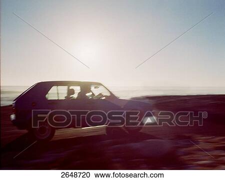 Silhouette of people traveling in car at beach, Western Cape Province, South Africa View Large Photo Image Stock Image - Silhouette of people traveling in car at beach, Western Cape Province, South Africa . Fotosearch