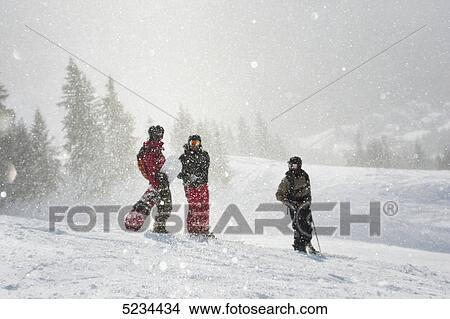 Picture - Skier and snowboarder . Fotosearch