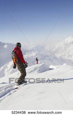 Skier and snowboarder View Large Photo Image Stock Photo - Skier and snowboarder . Fotosearch