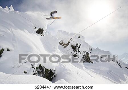 Skier jumping View Large Photo Image Stock Photo - Skier jumping . Fotosearch