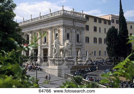 Stock Photograph - Statue at corner of palace, Campidoglio Palace, Rome, Italy . Fotosearch