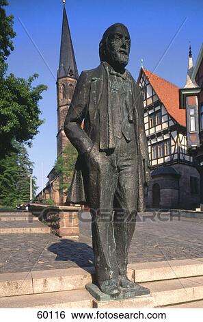 Stock Photograph - Theodor Storm memorial in front of church, Eichsfeld, Lower Saxony, Germany . Fotosearch