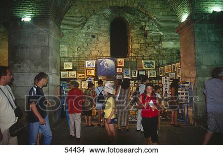 Tourists in front of market stall, Split, Dalmatia, Croatia View Large Photo Image Picture - Tourists in front of market stall, Split, Dalmatia, Croatia . Fotosearch