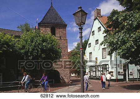Tourists in town street, Greetsiel, East Frisia, Lower Saxony, Germany View Large Photo Image Stock Image - Tourists in town street, Greetsiel, East Frisia, Lower Saxony, Germany . Fotosearch