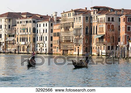 Stock Photograph - Two gondolas on a canal, Venice, Italy . Fotosearch