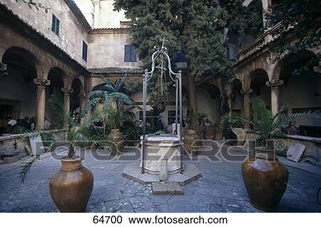 Stock Image - Well in courtyard of house . Fotosearch