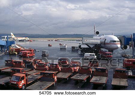 Airplane at airport, Madrid-Barajas Airport, Madrid, Spain View Large Photo Image Stock Photography - Airplane at airport, Madrid-Barajas Airport, Madrid, Spain . Fotosearch