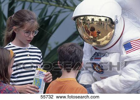 Stock Image - Astronaut meeting with children at space center, NASA Kennedy Space Center, Florida, USA . Fotosearch