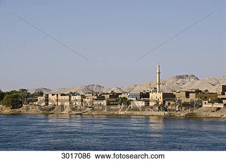 Stock Photograph - Bank of the Nile in Esna, Egypt . Fotosearch