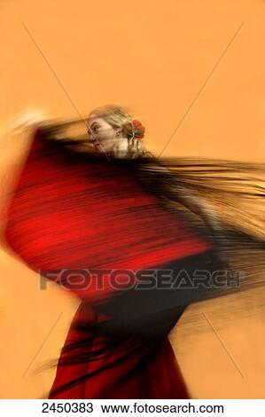 Blurred view of female flamenco dancer dancing View Large Photo Image Stock Image - Blurred view of female flamenco dancer dancing . Fotosearch