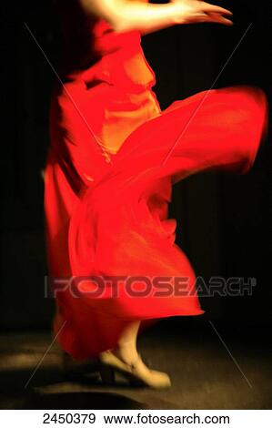 Blurred view of female flamenco dancer dancing View Large Photo Image Stock Photo - Blurred view of female flamenco dancer dancing . Fotosearch