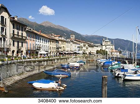 Stock Image - Boats in a port basin of Cannobio, Piedmont, Italy . Fotosearch