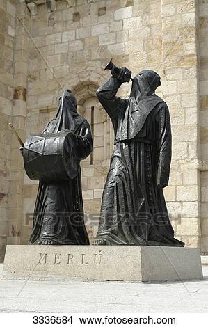Bronze statues in front of the San Juan de Puerta Nueva Church, low angle view  View Large Photo Image Picture - Bronze statues in front of the San Juan de Puerta Nueva Church, low angle view . Fotosearch