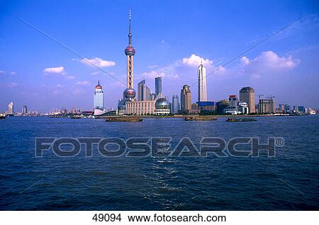 Picture - Buildings at waterfront, Huangpu River, Oriental Pearl Tower, Pudong, Shanghai, China . Fotosearch