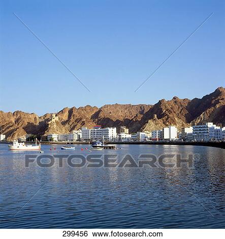 Stock Photograph - Buildings at waterfront, Mutrah, Muscat, Oman . Fotosearch