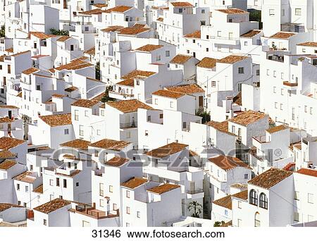 Stock Photograph - Buildings in town, Casares, Malaga Province, Andalusia, Spain . Fotosearch