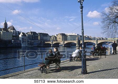 Stock Image - Buildings on waterfront, Rhine River, Basel, Switzerland . Fotosearch