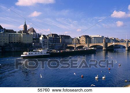 Stock Image - Buildings on waterfront, Rhine River, Basel, Switzerland . Fotosearch