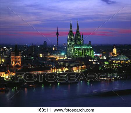 Buildings with cathedral at waterfront, Cologne Cathedral, Cologne, North Rhine Westphalia, Germany View Large Photo Image Stock Image - Buildings with cathedral at waterfront, Cologne Cathedral, Cologne, North Rhine Westphalia, Germany . Fotosearch