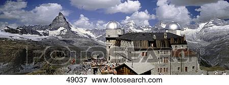 Buildings with mountain ranges on landscape, Mt Matterhorn, Gornergrat, Switzerland View Large Photo Image Stock Photo - Buildings with mountain ranges on landscape, Mt Matterhorn, Gornergrat, Switzerland . Fotosearch