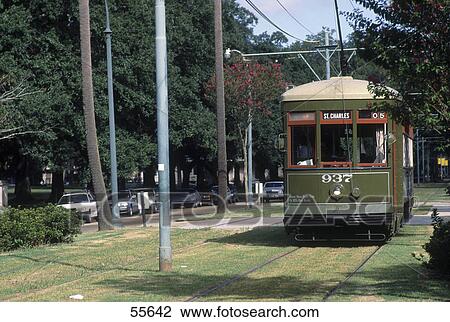 Stock Image - Cable car on tracks, St. Charles Streetcar, New Orleans, Louisiana, USA . Fotosearch