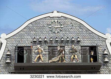 Stock Image - Carillon at the market square in Goslar, Germany, low angle view . Fotosearch