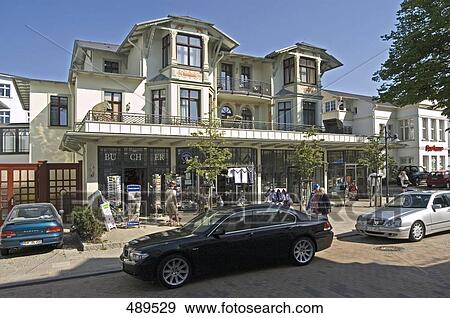 Cars in front of building, Ahlbeck, Uecker-Randow, Mecklenburg-Vorpommern, Germany View Large Photo Image Stock Photo - Cars in front of building, Ahlbeck, Uecker-Randow, Mecklenburg-Vorpommern, Germany . Fotosearch