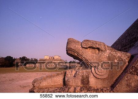 Stock Image - Carving detail of serpent head in temple, Temple Of The Warriors, Chichen Itza, Yucatan, Mexico . Fotosearch