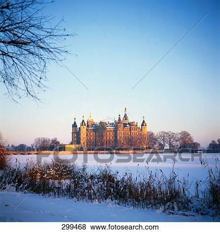 Castle on snow-covered landscape, Schwerin Castle, Schwerin, Germany View Large Photo Image Stock Photo - Castle on snow-covered landscape, Schwerin Castle, Schwerin, Germany . Fotosearch