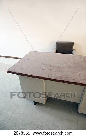 Stock Photography - Chair and table in office room . Fotosearch