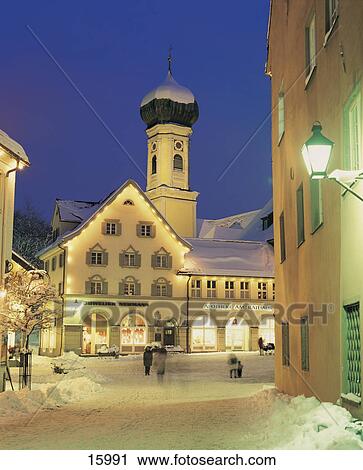 Stock Image - Church in winter at night, St Nikolaus Church, Immenstadt, Allgau, Bavaria, Germany . Fotosearch