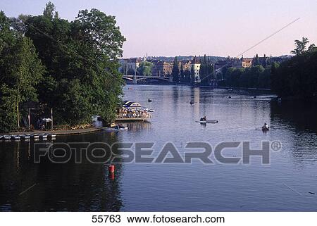 Stock Image - City at waterfront, Vltava River, Prague, Czech Republic . Fotosearch